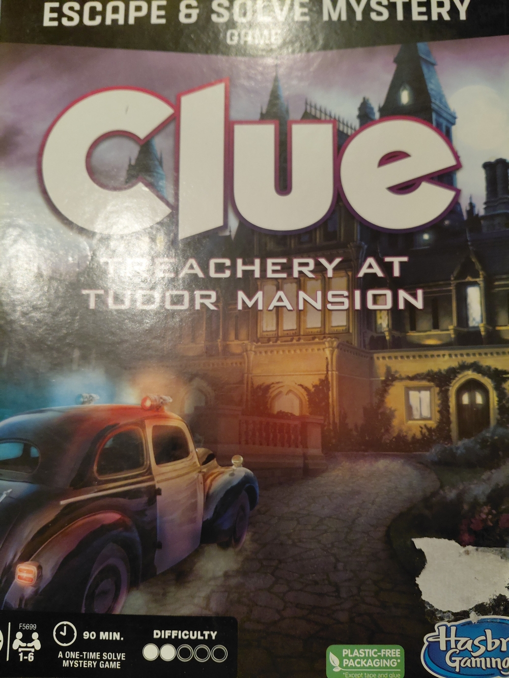 Clue: Treachery at Tudor Mansion Board Game - Purple & Multicolor Box